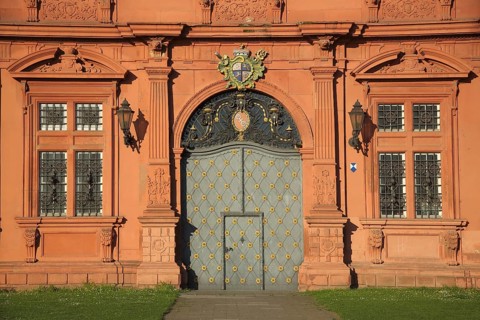 Red portal with coat of arms, door with fittings and decorations, baroque, red, Electoral Palace,