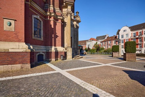 Facade with memorial plaque to Ernst Georg Sonnin, the builder of the main church of St Michaelis,
