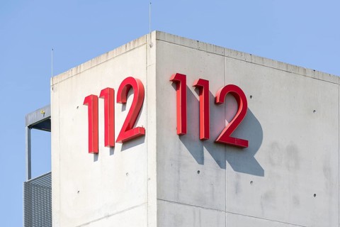 Symbolic image, emergency number 112 on a building, facade, emergency call, emergency, police, fire