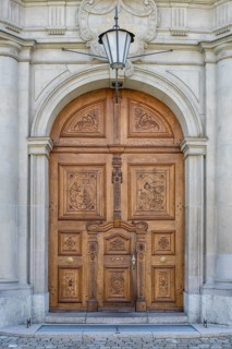 Artfully decorated wooden portal of the collegiate church, St. Gallen Cathedral, UNESCO World