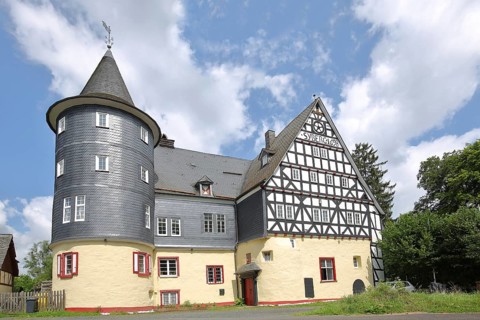 Castle built in 1523, slate house, half-timbered house, corner tower, Junkernhees, Kreuztal,
