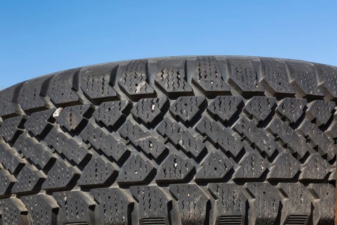 Close-up of threads on black rubber truck tire, Quebec, Canada, North America