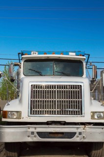 Front end of International truck cab with damaged windshield, Quebec, Canada, North America