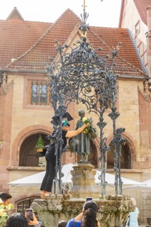 The Gänseliesel fountain is a market and ornamental fountain on the market square in front of the