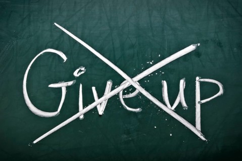 Do not give up, words on blackboard