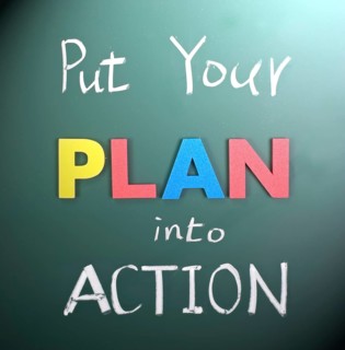 Put your plan into action, words on blackboard