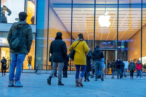 Shopping street, queues in front of the Apple Store, due to limited capacity of customers in the