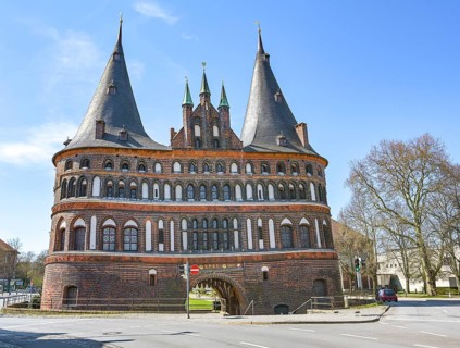 Holstentor (Holsten gate), famous historic landmark with two round towers and entrance of the