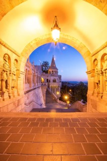 Old historic fortress and church at sunrise. City panorama at dusk. View of the Danube Fishermen's