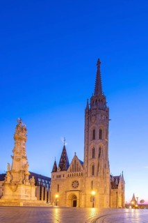 Old historic fortress and church at sunrise. City panorama at dusk. View of the Danube Fishermen's