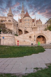 Old historic fortress and church at sunrise. City panorama at dusk. View of the Danube Fishermen's