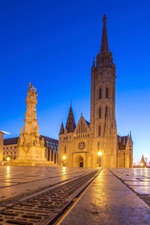 Old historic fortress and church at sunrise. City panorama at dusk. View of the Danube Fishermen's
