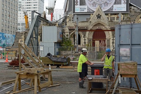 CHRISTCHURCH, NEW ZEALAND, FEBRUARY 24, 2022: A team of tradesmen work on the Anglican Cathedral