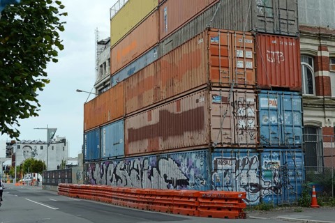 CHRISTCHURCH, NEW ZEALAND, FEBRUARY 24, 2022: Shipping containers continue to stabilise a damaged