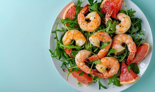 Shrimp and grapefruit salad with arugula on a light blue background AI generated