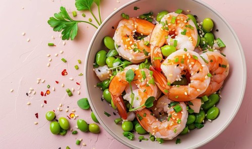 Shrimp and edamame salad with sesame seeds on a light pink background AI generated
