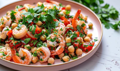 Shrimp and chickpea salad with parsley on a pastel pink plate AI generated