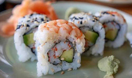 Shrimp and avocado sushi rolls on a pastel green plate AI generated