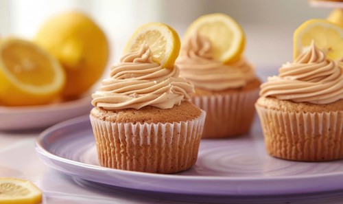 Lemon and coffee cupcakes with frosting on a pastel purple plate AI generated