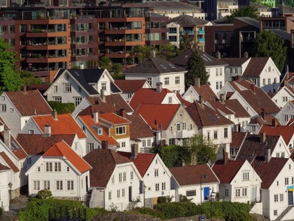 Densely packed houses with red roofs form a picturesque neighbourhood, Stavanger, Norway, Europe