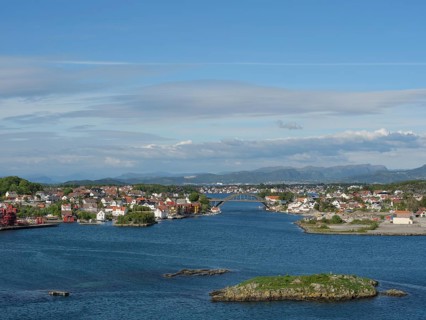 View of a city with houses and islands by the sea, surrounded by sky and clouds, Stavanger, Norway,