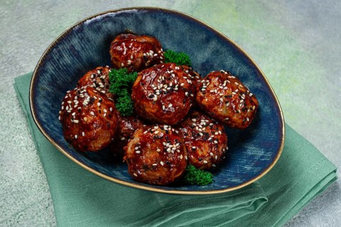 Tsukune, Japanese meatballs, minced chicken, fried on a skewer, with yakitori sauce, homemade, no