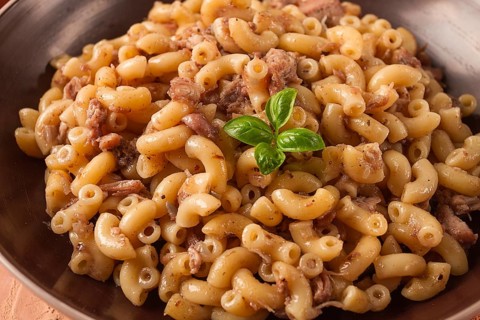 Pasta with stewed meat, pasta in the navy, horns, homemade, no people