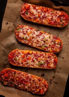Pizza on a baguette, top view, close-up, no people, fast food, street food