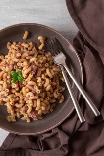 Pasta with stewed meat, pasta in the navy, horns, homemade, no people