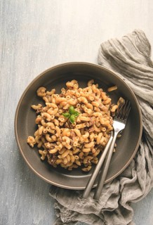 Pasta with stewed meat, pasta in the navy, horns, homemade, no people