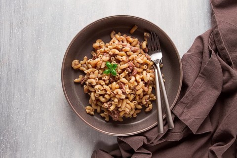 Pasta with stewed meat, pasta in the navy, horns, homemade, no people