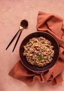 Pasta with stewed meat, pasta in the navy, horns, homemade, no people