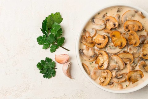 Mushrooms in creamy garlic sauce, with herbs and spices, gravy, sauce, no people