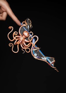 Creative design of nails on female hands. Art manicure. Photo taken in studio