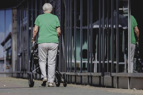 A woman with a rollator, photographed in Berlin, 07/08/2024