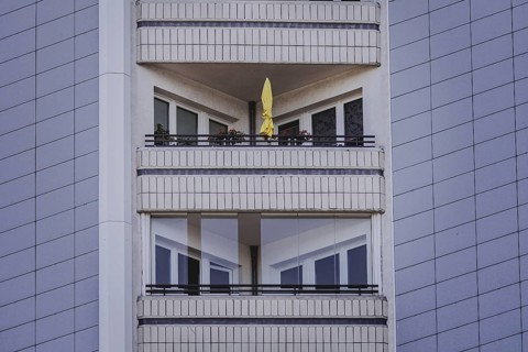 A parasol on a balcony of a block of flats, taken in Berlin, 07/08/2024