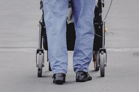 A woman with a rollator, photographed in Berlin, 07/08/2024