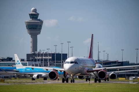 Aircraft at Amsterdam Schiphol Airport, on the taxiway for take-off on the Aalsmeerbaan, 18L/36R,