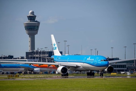 Aircraft at Amsterdam Schiphol Airport, on the taxiway for take-off on the Aalsmeerbaan, 18L/36R,