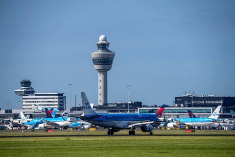 KLM Embraer E190STD aircraft landing at Amsterdam Schiphol Airport, Buitenveldertbaan, 09/27, Air