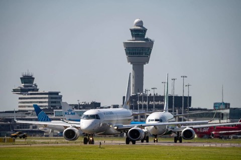 Aircraft at Amsterdam Schiphol Airport, on the taxiway for take-off on the Aalsmeerbaan, 18L/36R,