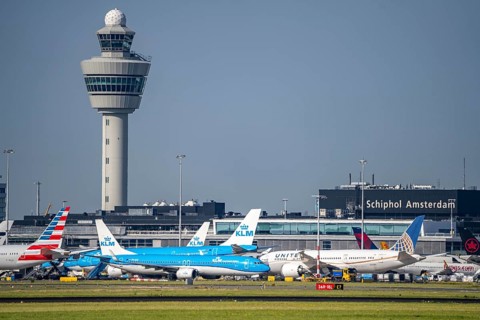Aircraft at Amsterdam Schiphol Airport, taxiway, apron, air traffic control tower, terminal,
