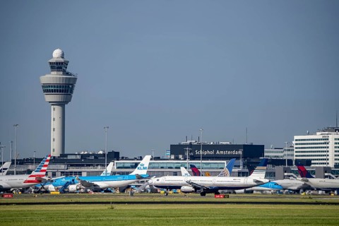 Aircraft at Amsterdam Schiphol Airport, taxiway, apron, air traffic control tower, terminal,