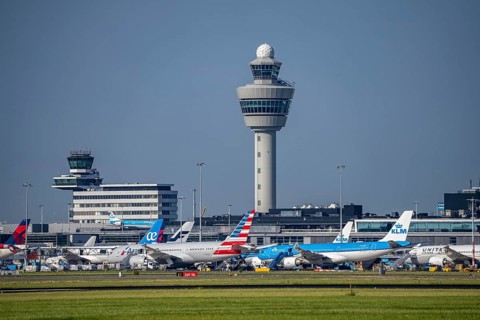 Aircraft at Amsterdam Schiphol Airport, taxiway, apron, air traffic control tower, terminal,