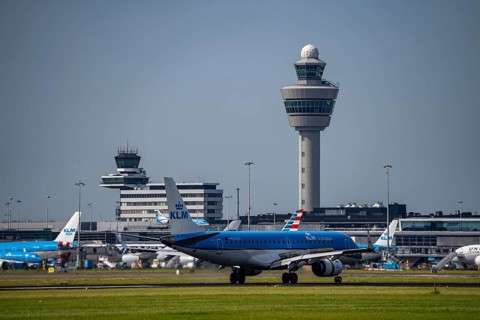 KLM Embraer E190STD aircraft landing at Amsterdam Schiphol Airport, Buitenveldertbaan, 09/27, Air