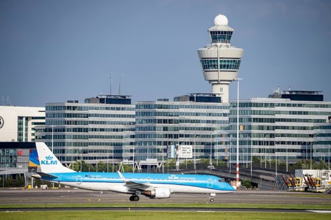 Amsterdam Schiphol Airport, KLM aircraft, Embraer E190STD, on the taxiway, in the background