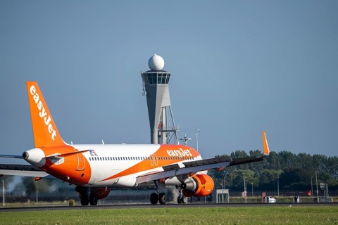Easyjet aircraft after landing at Amsterdam Schiphol Airport, Polderbaan, 18R/36L, taxiway to
