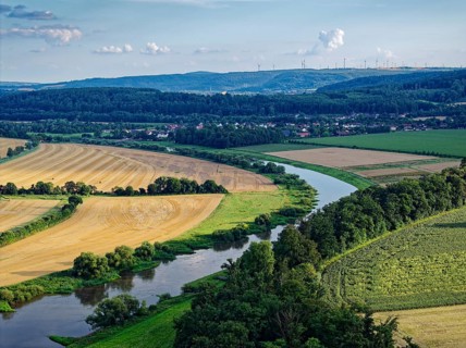 The Upper Weser flows through the southern Weserbergland between Beverungen and Höxter. Aerial