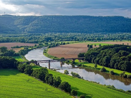 The Upper Weser flows through the southern Weserbergland between Beverungen and Höxter. Aerial