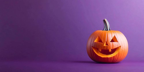 Halloween banner with orange carved pumpkin on purple background with copy space. Generative Ai, AI